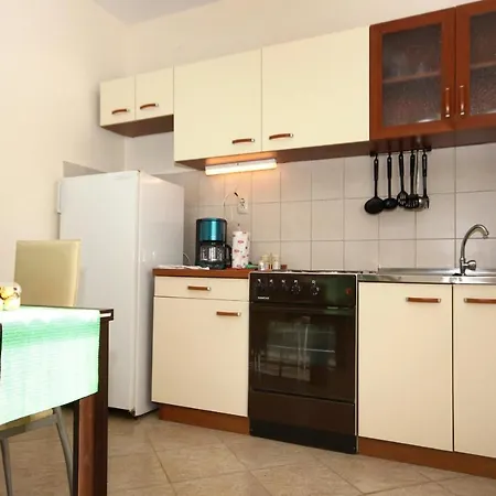 Apartamento Arbanija 9423a Trogir